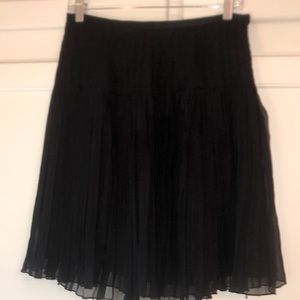 Silk pleated skirt.